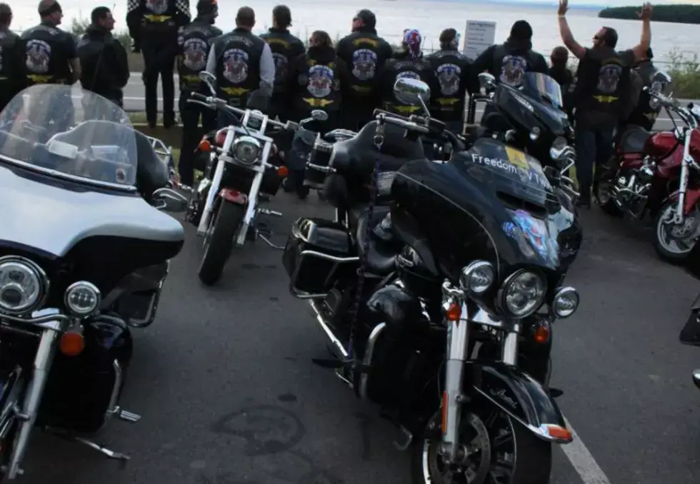 Hierarchy post bikers on V-Twin bikes at a show for a feature on anti-bikie laws